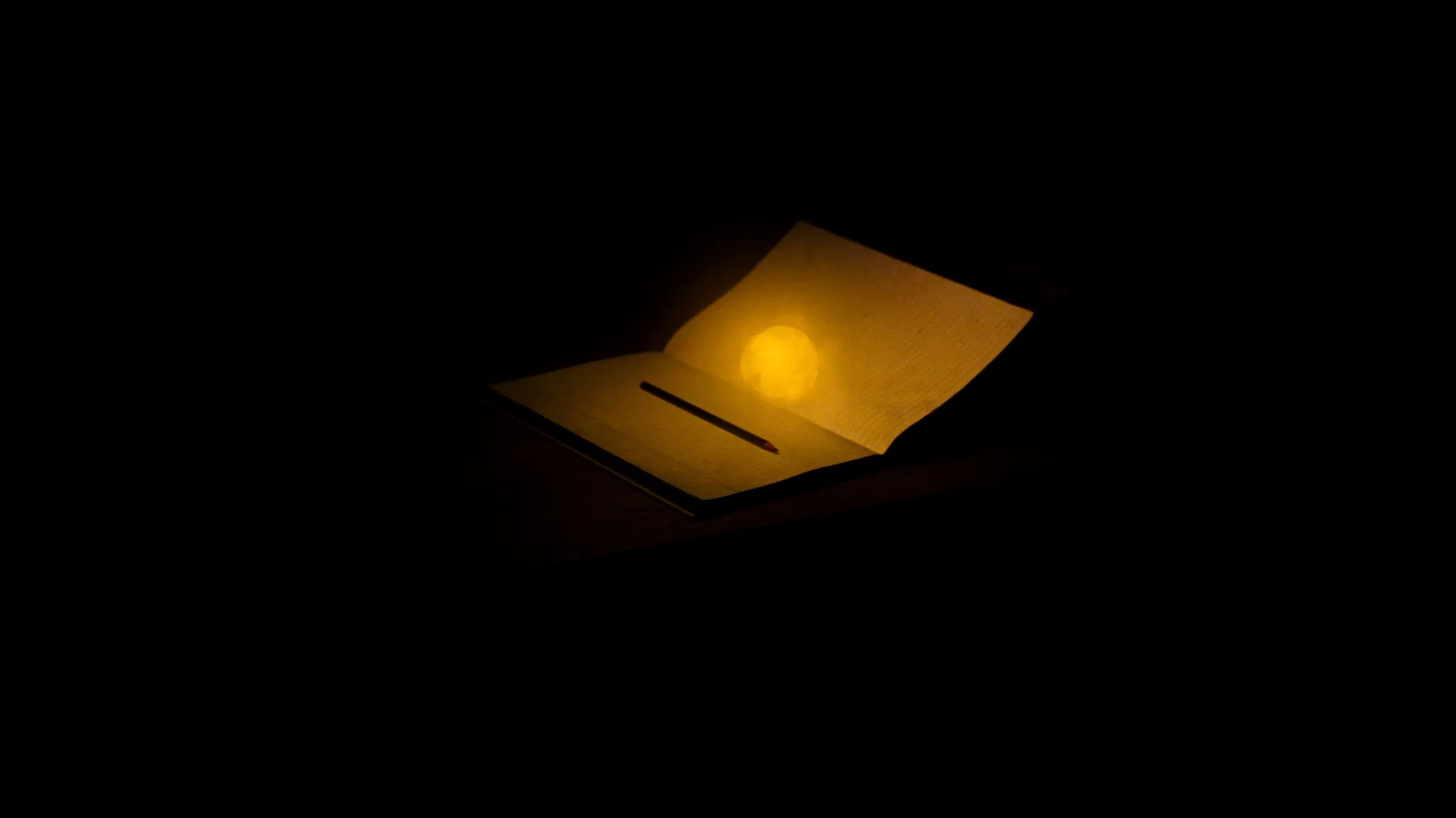 A live session: warm light over the working glass